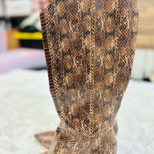 Louise et Cie Kamil brown leather pointed-toe knee-high boots.